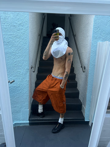 tek shorts orange