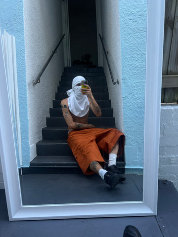 tek shorts orange